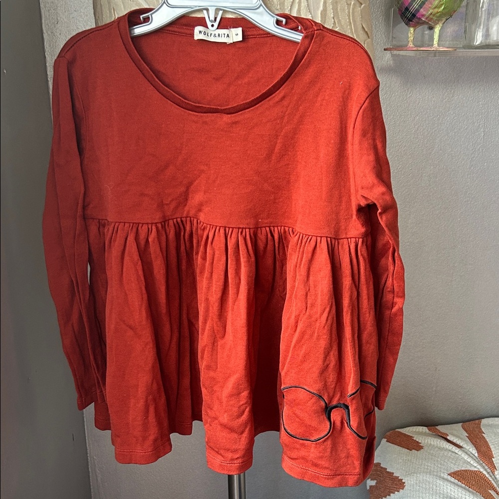 wolf & rita rust blouse with glasses